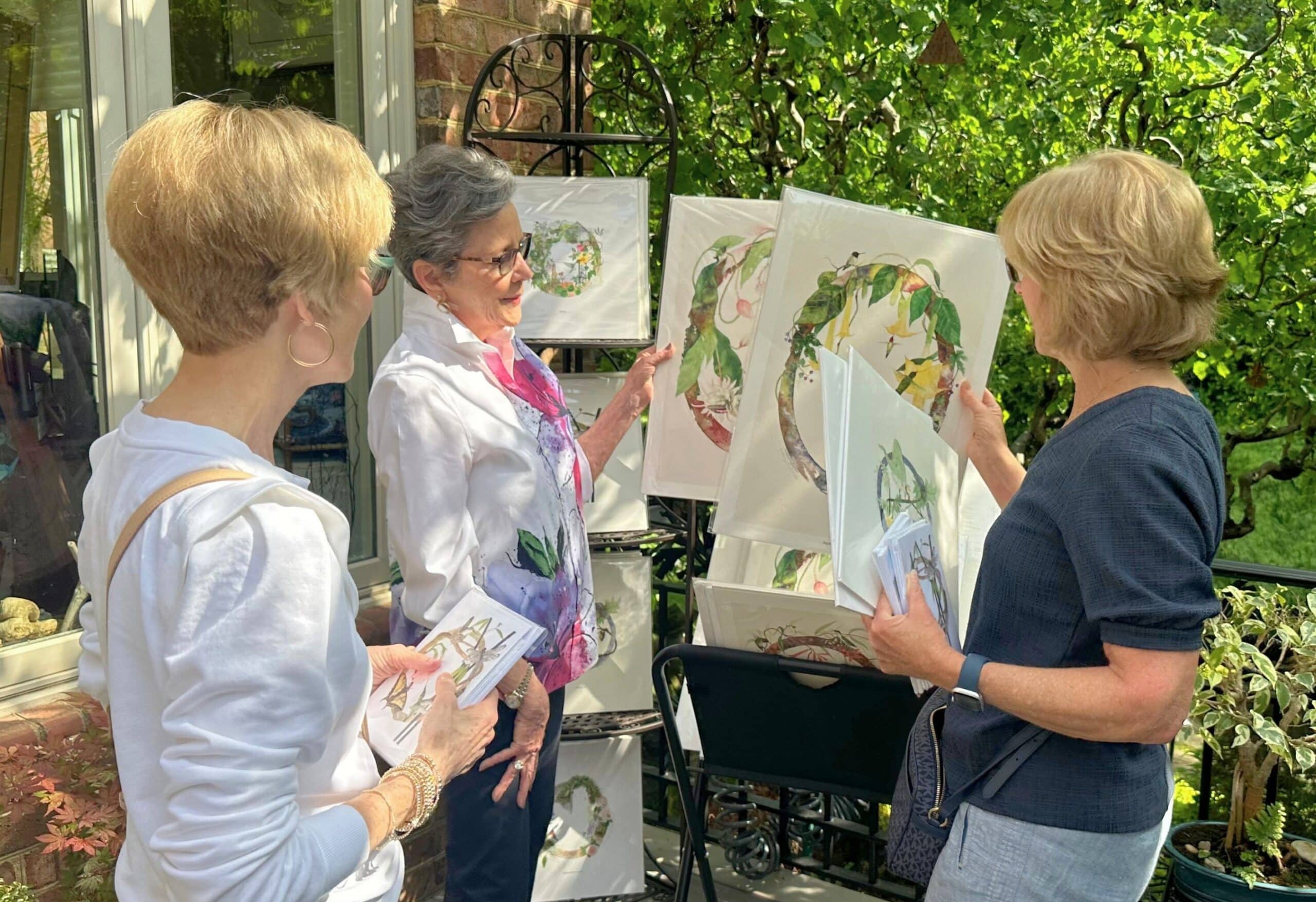 Two people talking in an art studio