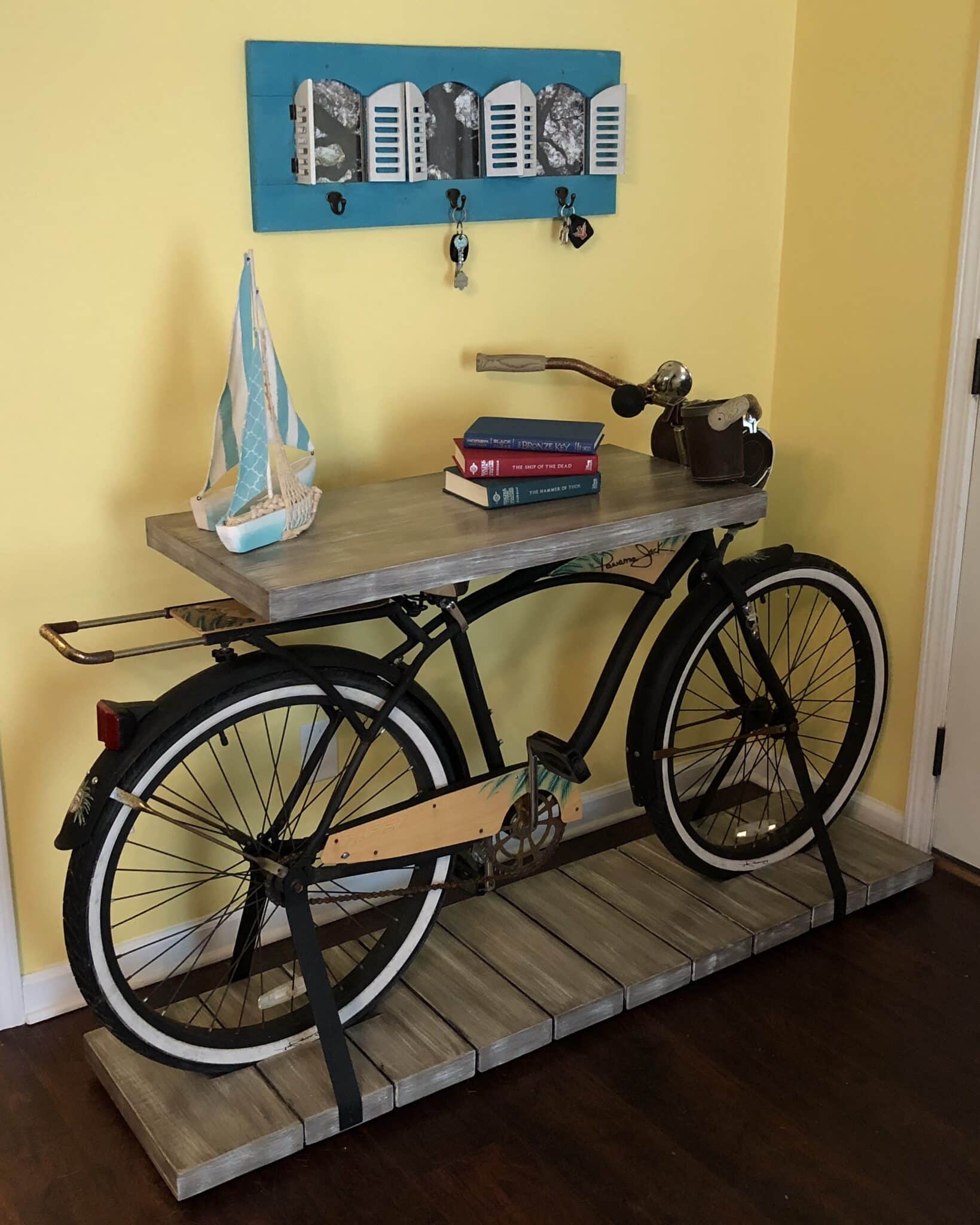 Bright artist studio with sketch easel and shelves