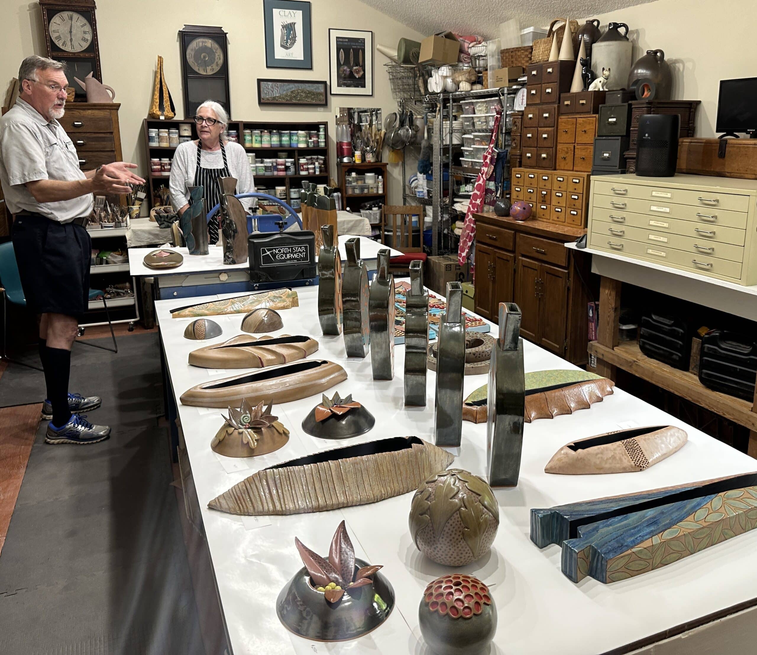 Artwork and ceramics displayed for sale in the studio